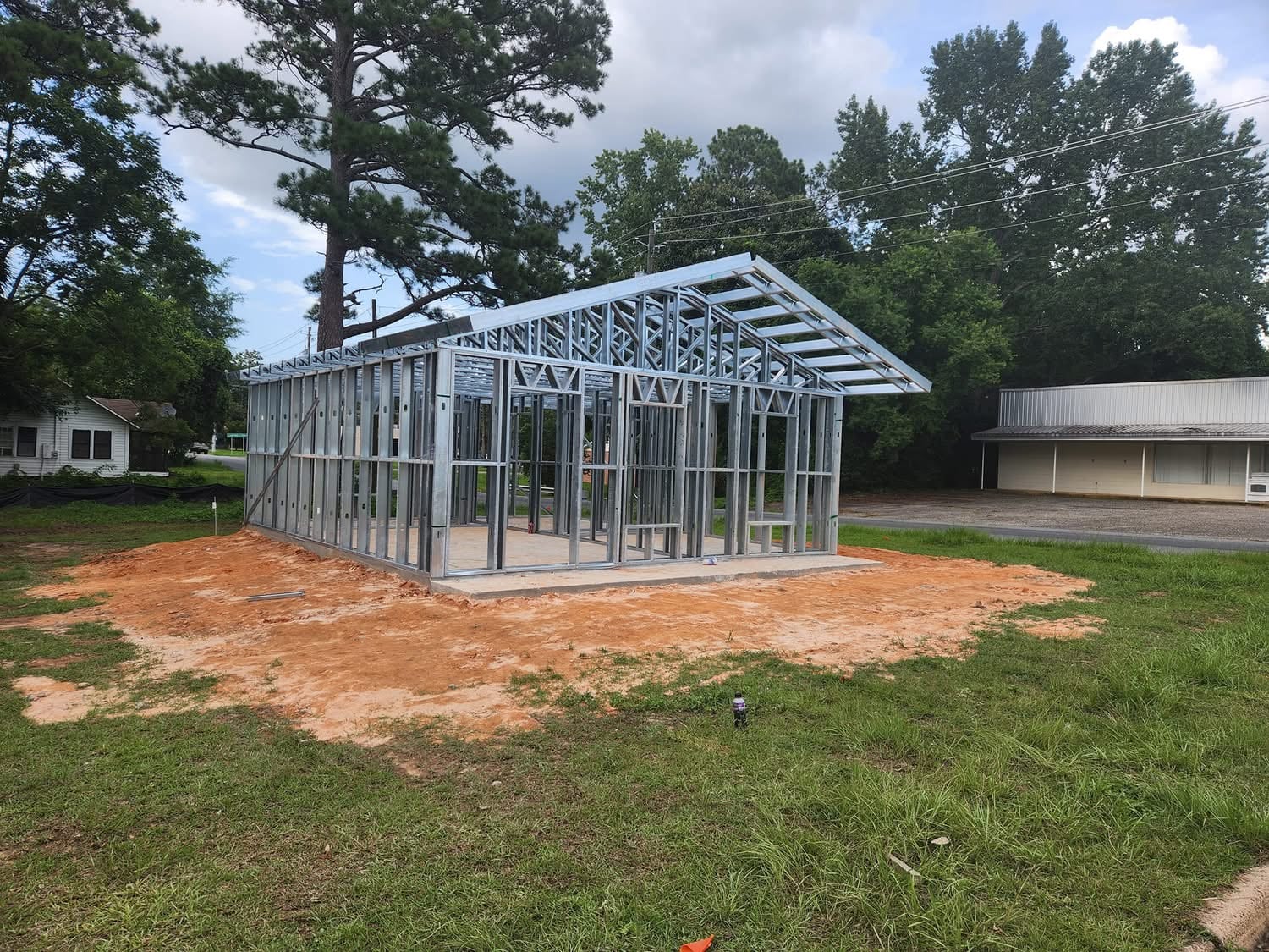 Steel barndominium frame with pitched roof in Alabama